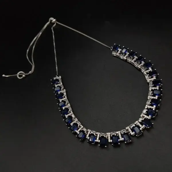 Intricate pendant necklace set with American diamonds